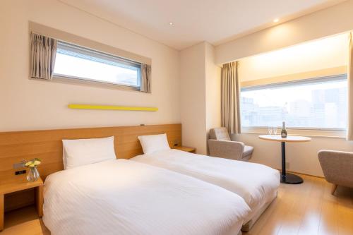 Habitación Doble con 2 camas Executive con suelo de madera - No fumadores del hotel Gracery Ginza. Foto 3