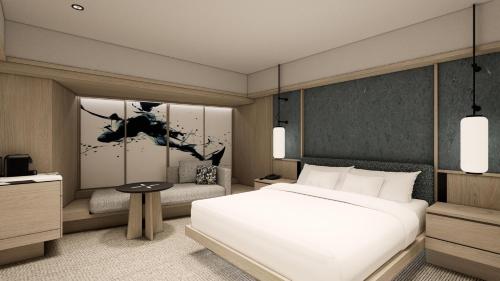 Habitación Familiar con cama extragrande y sofá cama del hotel Hilton Tokyo