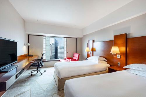 Habitación Hilton con 2 camas individuales del hotel Hilton Tokyo. Foto 3