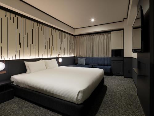 Habitación Superior con cama extragrande del hotel Mitsui Garden Shiodome Italia-gai. Foto 6