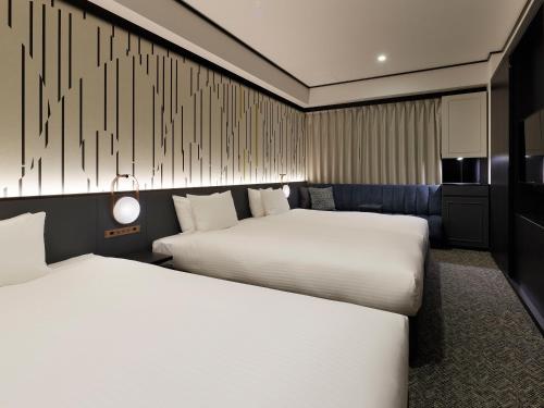 Habitación Triple Superior del hotel Mitsui Garden Shiodome Italia-gai. Foto 4