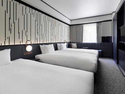 Habitación Triple Superior del hotel Mitsui Garden Shiodome Italia-gai. Foto 5