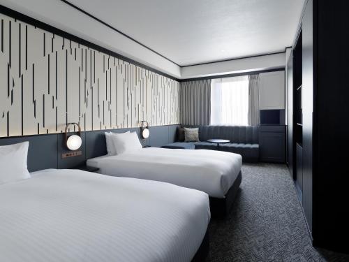 Superior Twin Room with Tokyo Tower View del hotel Mitsui Garden Shiodome Italia-gai. Foto 3