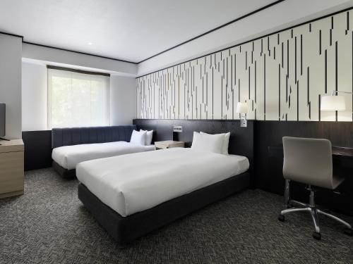 Habitación Doble adaptada para personas de movilidad reducida - 2 camas del hotel Mitsui Garden Shiodome Italia-gai. Foto 4