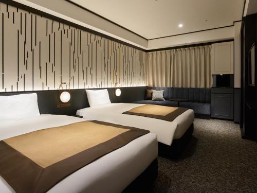 Superior Twin Room with Tokyo Tower View del hotel Mitsui Garden Shiodome Italia-gai. Foto 5