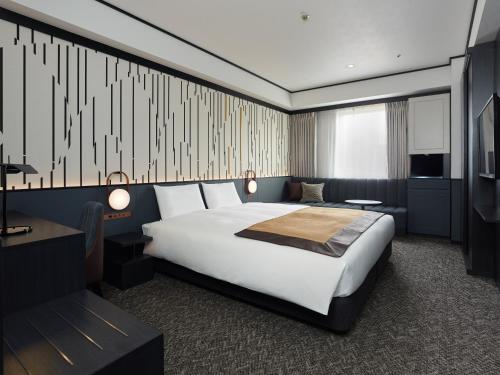 Habitación Superior con cama extragrande del hotel Mitsui Garden Shiodome Italia-gai. Foto 6