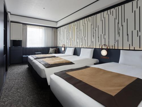 Habitación Triple Superior del hotel Mitsui Garden Shiodome Italia-gai. Foto 5