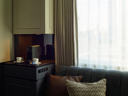 Habitación Triple Superior del hotel Mitsui Garden Shiodome Italia-gai. Foto 6
