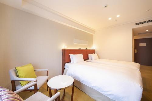 Habitación Doble Superior con acceso al salón - 2 camas - No fumadores del hotel Namba Oriental. Foto 5