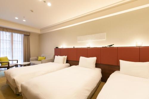 Deluxe Triple Room with Lounge Access del hotel Namba Oriental. Foto 2