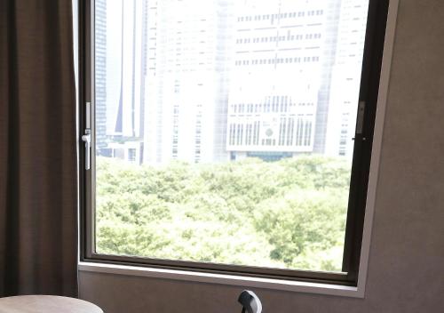 Habitación Superior de 17 m² con vistas al parque - 1 cama grande - No fumadores del hotel The Knot Tokyo Shinjuku