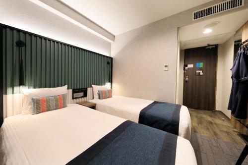Habitación Doble Estándar de 14 m² - 2 camas - No fumadores del hotel The Knot Tokyo Shinjuku. Foto 6