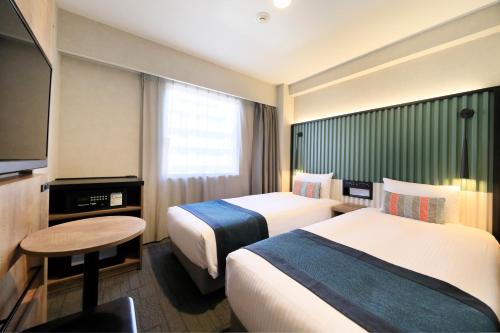 Habitación Doble Estándar de 14 m² - 2 camas - No fumadores del hotel The Knot Tokyo Shinjuku. Foto 8