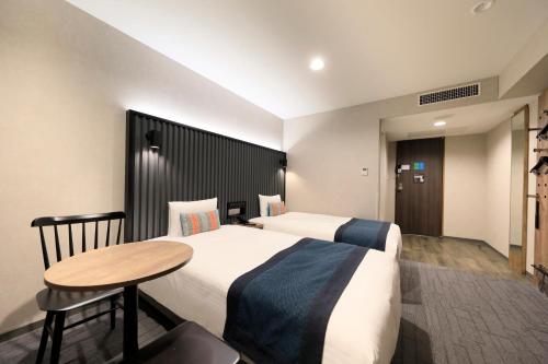 Habitación Doble Deluxe de 20 m² - 2 camas - No fumadores del hotel The Knot Tokyo Shinjuku. Foto 9