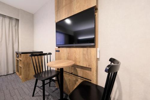 Habitación Triple Deluxe de 21 m² - No fumadores del hotel The Knot Tokyo Shinjuku. Foto 5