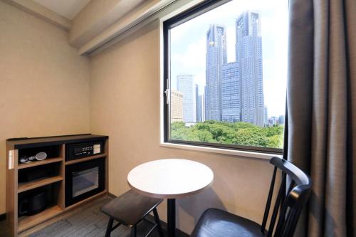 Habitación Doble Deluxe de 20 m² con vistas al parque - 2 camas - No fumadores del hotel The Knot Tokyo Shinjuku. Foto 5