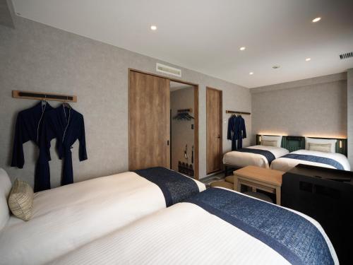 Habitación Deluxe Fouth de 28 m² en la primera planta del hotel The Knot Tokyo Shinjuku. Foto 2