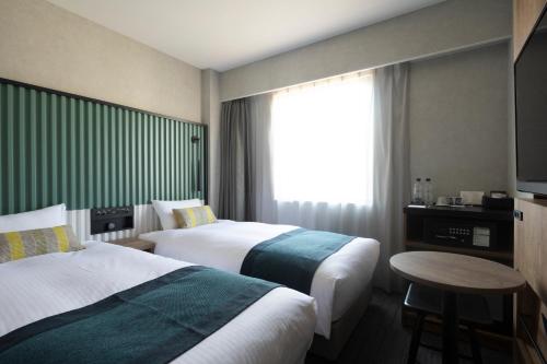 Habitación Doble Estándar de 14 m² - 2 camas - No fumadores del hotel The Knot Tokyo Shinjuku