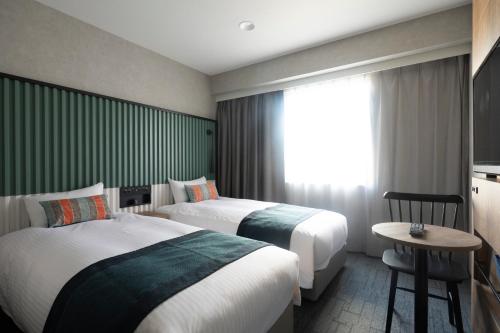 Habitación Doble Superior de 17 m² - 2 camas - No fumadores del hotel The Knot Tokyo Shinjuku. Foto 1