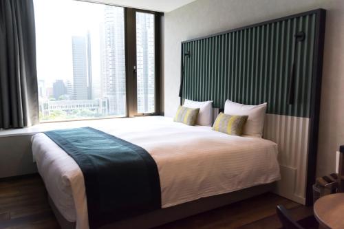 Habitación Superior Hollywood de 17 m² con vistas al parque - Planta superior - No fumadores del hotel The Knot Tokyo Shinjuku