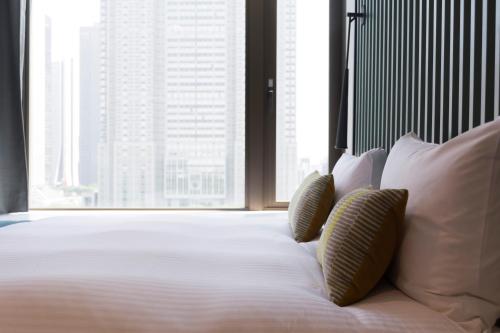Habitación Superior Hollywood de 17 m² con vistas al parque - Planta superior - No fumadores del hotel The Knot Tokyo Shinjuku. Foto 1