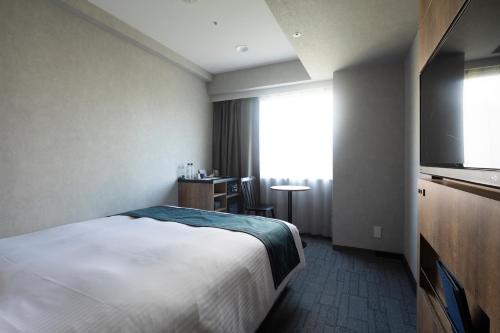 Habitación Superior de 17 m² con vistas al parque - 1 cama grande - No fumadores del hotel The Knot Tokyo Shinjuku. Foto 1