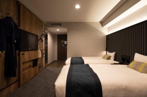 Habitación Doble Deluxe de 20 m² con vistas al parque - 2 camas - No fumadores del hotel The Knot Tokyo Shinjuku