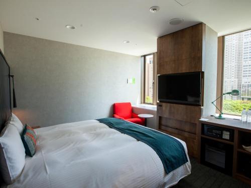 Habitación Deluxe Grande Hollywood de 26 m² - Última planta - No fumadores del hotel The Knot Tokyo Shinjuku