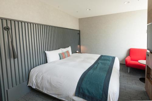 Habitación Deluxe Grande Hollywood de 26 m² - Última planta - No fumadores del hotel The Knot Tokyo Shinjuku. Foto 3