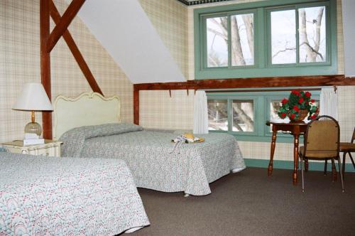 Habitación Doble - 2 camas dobles del hotel Winter Clove Family Inn. Foto 3