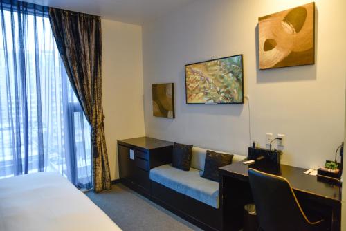 Habitación con cama extragrande. del hotel The One Boutique