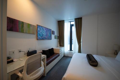 Habitación doble deluxe con cama grande y balcón del hotel The One Boutique. Foto 9