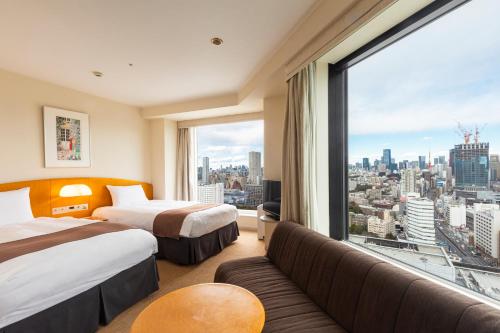 Habitación Doble Esquinera con sofá - 2 camas - Plantas 19 - 27 de la Torre principal - No fumadores del hotel Shinagawa Prince