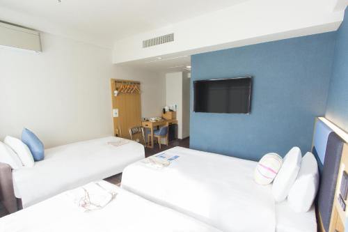 Habitación Doble Estándar con cama supletoria - No fumadores - 2 camas del hotel Hearton Kyoto