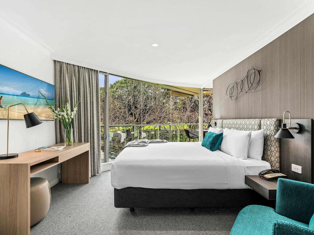 Apartamento Deluxe de dos habitaciones con camas King y vistas al jardín del hotel Pullman Quay Grand Sydney Harbour