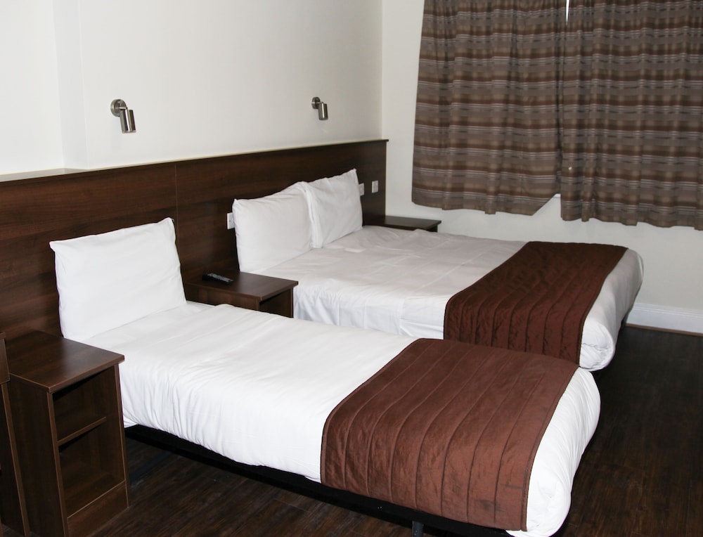 Habitación triple estándar del hotel Ascot Hyde Park
