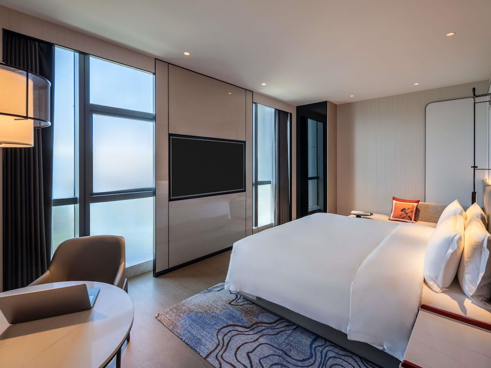 Habitación Deluxe con 1 cama king size del hotel Grand Mercure Yichang Waitan