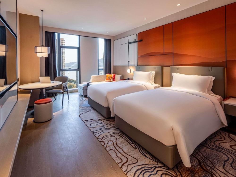 Habitación Deluxe con 2 camas individuales del hotel Grand Mercure Yichang Waitan