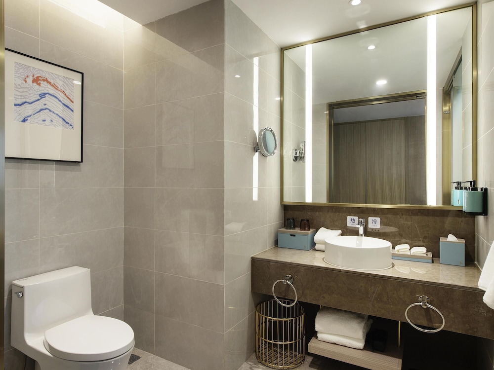 HABITACIÓN SUPERIOR con 1 cama king size del hotel Novotel Suzhou Huanxiu Lake. Foto 1
