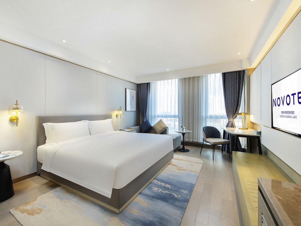 HABITACIÓN SUPERIOR con 1 cama king size del hotel Novotel Suzhou Huanxiu Lake. Foto 2