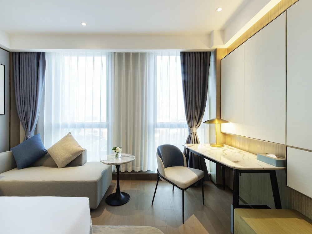 HABITACIÓN SUPERIOR con 1 cama king size del hotel Novotel Suzhou Huanxiu Lake. Foto 4