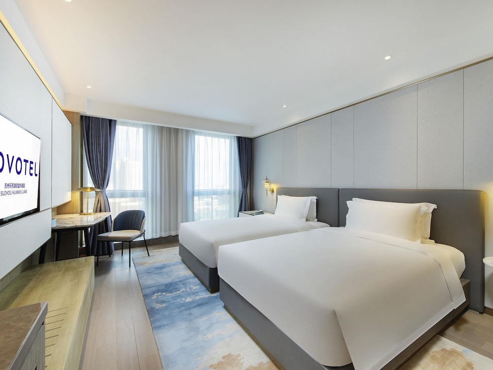 Habitación superior con 2 camas individuales del hotel Novotel Suzhou Huanxiu Lake