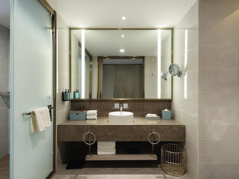 Habitación superior con 2 camas individuales del hotel Novotel Suzhou Huanxiu Lake. Foto 1