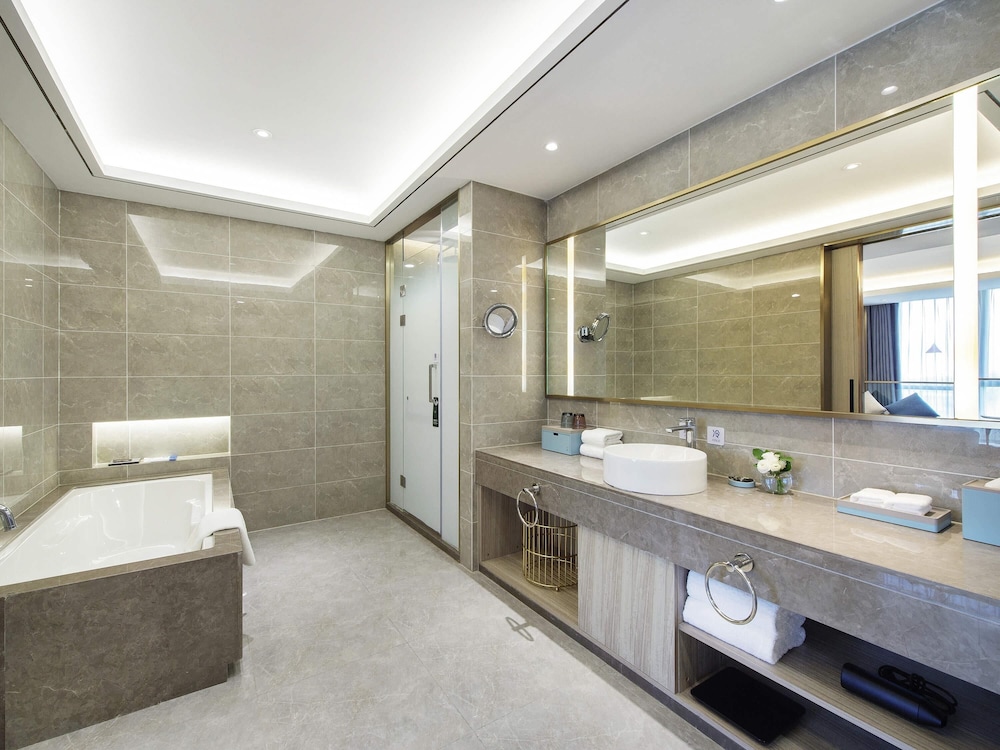 Suite Deluxe con 1 cama King Size del hotel Novotel Suzhou Huanxiu Lake. Foto 2