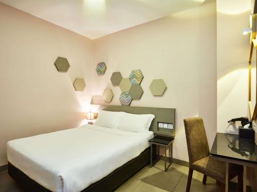 Habitación estándar con 2 camas individuales del hotel Ibis Budget Singapore Imperial