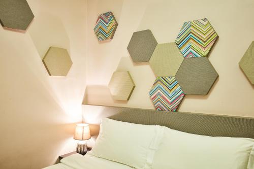 Habitación estándar con 2 camas individuales del hotel Ibis Budget Singapore Imperial. Foto 3