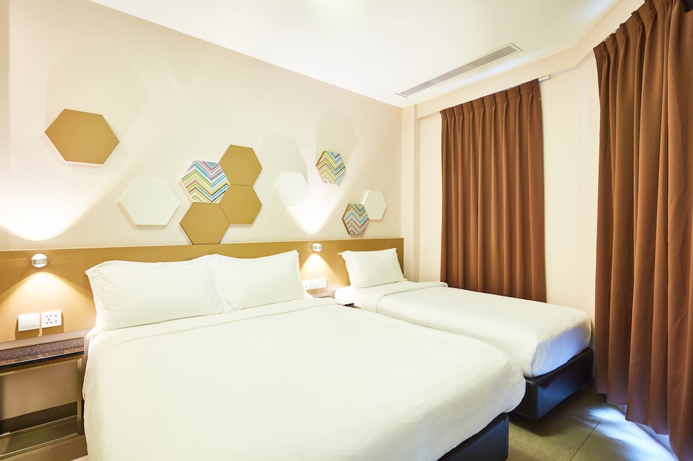Habitación Superior con 1 cama doble y 1 cama individual del hotel Ibis Budget Singapore Imperial