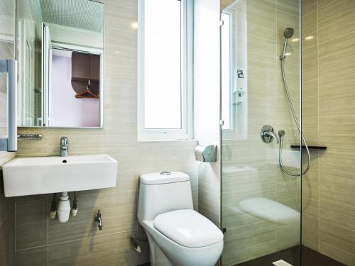 Habitación Superior con 2 camas dobles del hotel Ibis Budget Singapore Joo Chiat (sg Clean). Foto 3