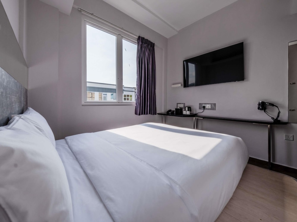 Habitación Deluxe con 1 cama doble del hotel Ibis Budget Singapore Pearl (sg Clean). Foto 1