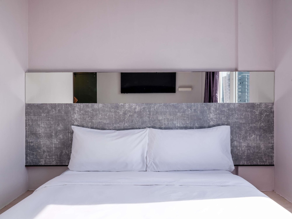 Habitación Deluxe con 1 cama doble del hotel Ibis Budget Singapore Pearl (sg Clean). Foto 3